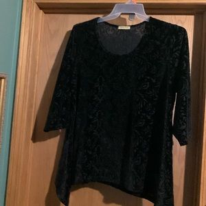 Long sleeved top - looks flocked - handkerchief hem